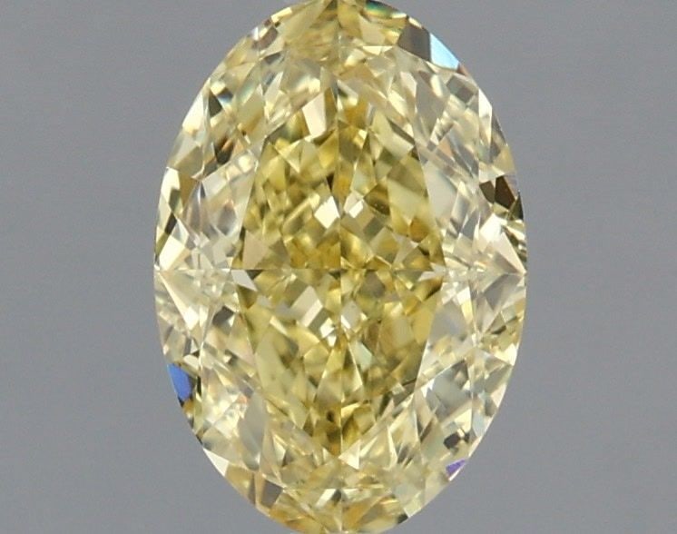 Loose Diamond - OVAL 1.17ct Fancy Intense Yellow VVS2: Loose Diamond - OVAL 1.17ct Fancy Intense Yellow VVS2 Source: This is a real non-mined Diamond that has been grown in a lab Shape: OVAL Carats: 1.17 Color: Fancy Intense Yellow Certification: IGI Vide