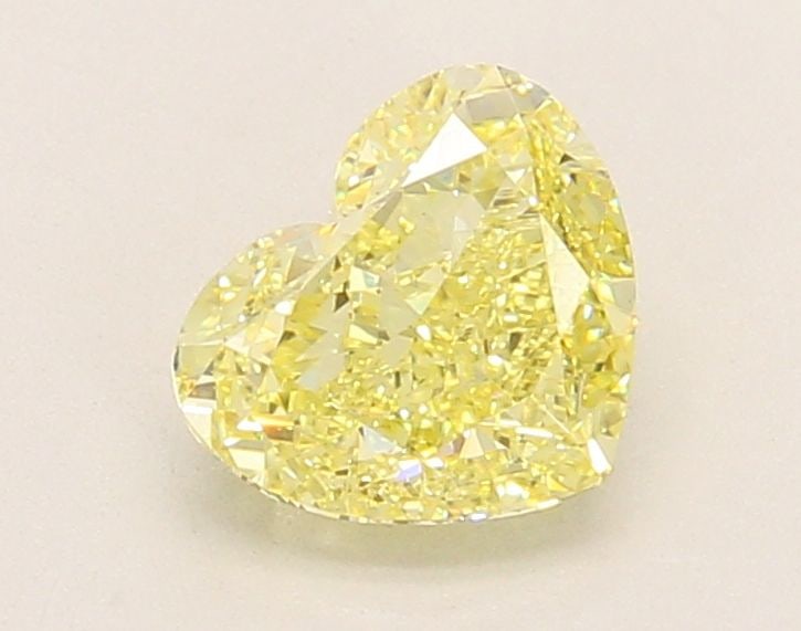 Loose Diamond - HEART 1.29ct Fancy Intense Yellow VS1: Loose Diamond - HEART 1.29ct Fancy Intense Yellow VS1 Source: This is a real non-mined Diamond that has been grown in a lab Shape: HEART Carats: 1.29 Color: Fancy Intense Yellow Certification: IGI Vid