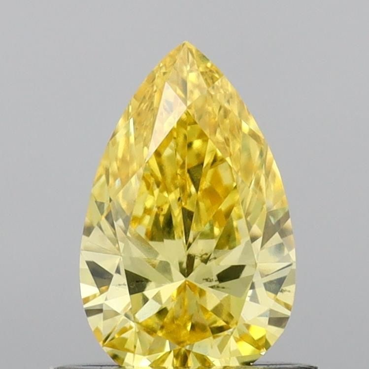 Loose Diamond - PEAR 0.65ct Fancy Vivid Yellow VS2: Loose Diamond - PEAR 0.65ct Fancy Vivid Yellow VS2 Source: This is a real non-mined Diamond that has been grown in a lab Shape: PEAR Carats: 0.65 Color: Fancy Vivid Yellow Certification: IGI Video:
