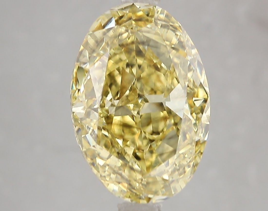 Loose Diamond - OVAL 5.03ct Fancy Intense Yellow SI1: Loose Diamond - OVAL 5.03ct Fancy Intense Yellow SI1 Source: This is a real non-mined Diamond that has been grown in a lab Shape: OVAL Carats: 5.03 Color: Fancy Intense Yellow Certification: IGI Video