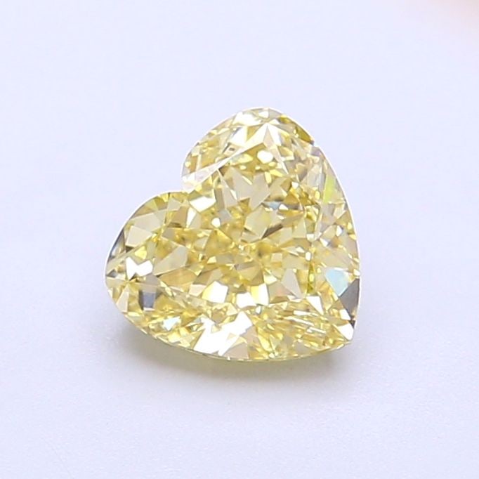 Loose Diamond - HEART 1.05ct Fancy Yellow VS1: Loose Diamond - HEART 1.05ct Fancy Yellow VS1 Source: This is a real non-mined Diamond that has been grown in a lab Shape: HEART Carats: 1.05 Color: Fancy Yellow Certification: IGI Video: