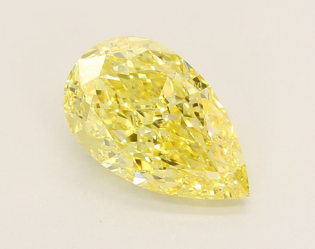 Loose Diamond - PEAR 3.5ct Fancy Vivid Yellow VS1: Loose Diamond - PEAR 3.5ct Fancy Vivid Yellow VS1 Source: This is a real non-mined Diamond that has been grown in a lab Shape: PEAR Carats: 3.5 Color: Fancy Vivid Yellow Certification: IGI Video: