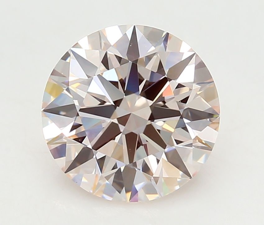 Ideal Loose Diamond - ROUND 3.0ct Fancy Light Pink VVS2: Ideal Loose Diamond - ROUND 3.0ct Fancy Light Pink VVS2 Source: This is a real non-mined Diamond that has been grown in a lab Shape: ROUND Carats: 3.0 Color: Fancy Light Pink Certification: IGI Video: