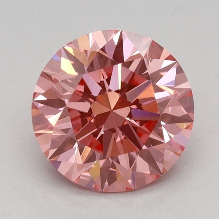 Ideal Loose Diamond - ROUND 1.15ct Fancy Vivid Pink VVS2: Ideal Loose Diamond - ROUND 1.15ct Fancy Vivid Pink VVS2 Source: This is a real non-mined Diamond that has been grown in a lab Shape: ROUND Carats: 1.15 Color: Fancy Vivid Pink Certification: IGI Vide