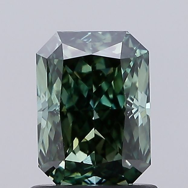 Loose Diamond - RADIANT 1.09ct Fancy Deep Green VS2: Loose Diamond - RADIANT 1.09ct Fancy Deep Green VS2 Source: This is a real non-mined Diamond that has been grown in a lab Shape: RADIANT Carats: 1.09 Color: Fancy Deep Green Certification: IGI Video: