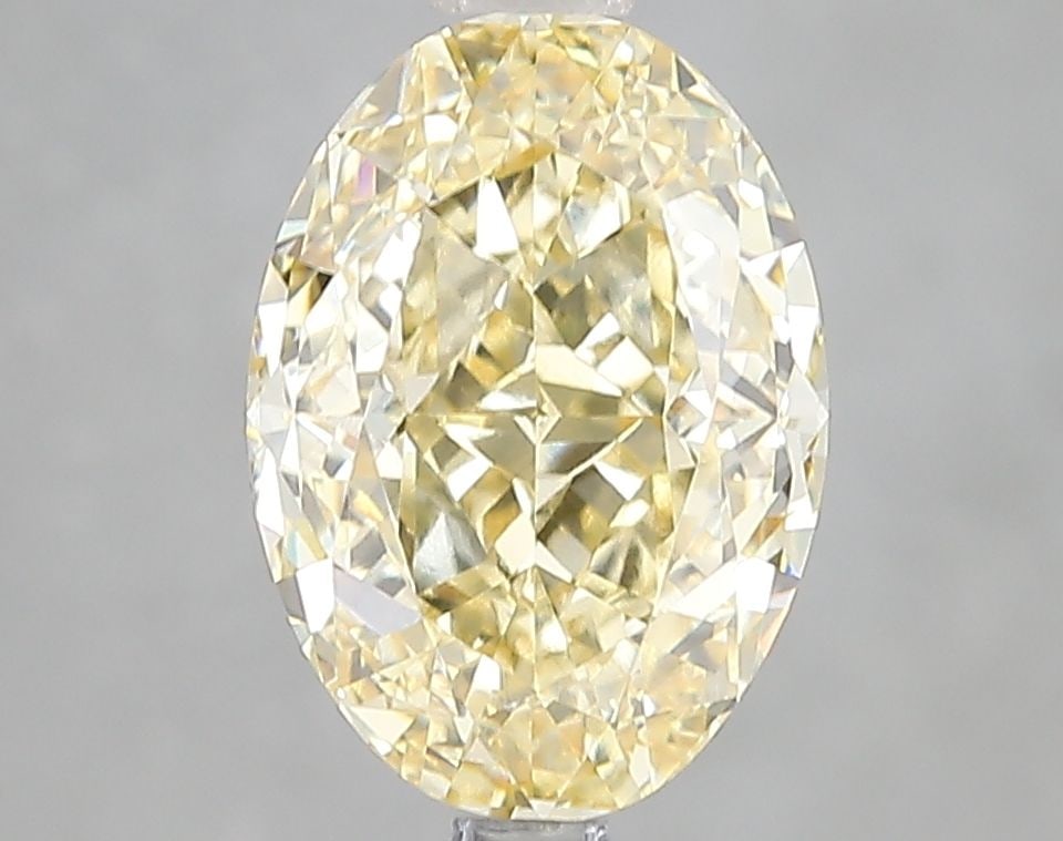 Loose Diamond - OVAL 3.1ct Fancy Intense Yellow VS1: Loose Diamond - OVAL 3.1ct Fancy Intense Yellow VS1 Source: This is a real non-mined Diamond that has been grown in a lab Shape: OVAL Carats: 3.1 Color: Fancy Intense Yellow Certification: IGI Video: