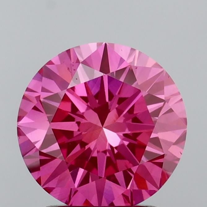 Loose Diamond - ROUND 2.0ct Fancy Vivid Pink VS1: Loose Diamond - ROUND 2.0ct Fancy Vivid Pink VS1 Source: This is a real non-mined Diamond that has been grown in a lab Shape: ROUND Carats: 2.0 Color: Fancy Vivid Pink Certification: IGI Video: