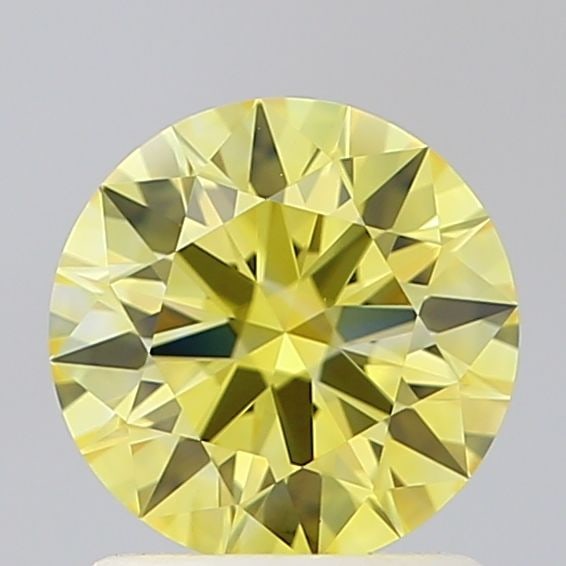 Ideal Loose Diamond - ROUND 1.09ct Fancy Vivid Yellow VVS2: Ideal Loose Diamond - ROUND 1.09ct Fancy Vivid Yellow VVS2 Source: This is a real non-mined Diamond that has been grown in a lab Shape: ROUND Carats: 1.09 Color: Fancy Vivid Yellow Certification: IGI 