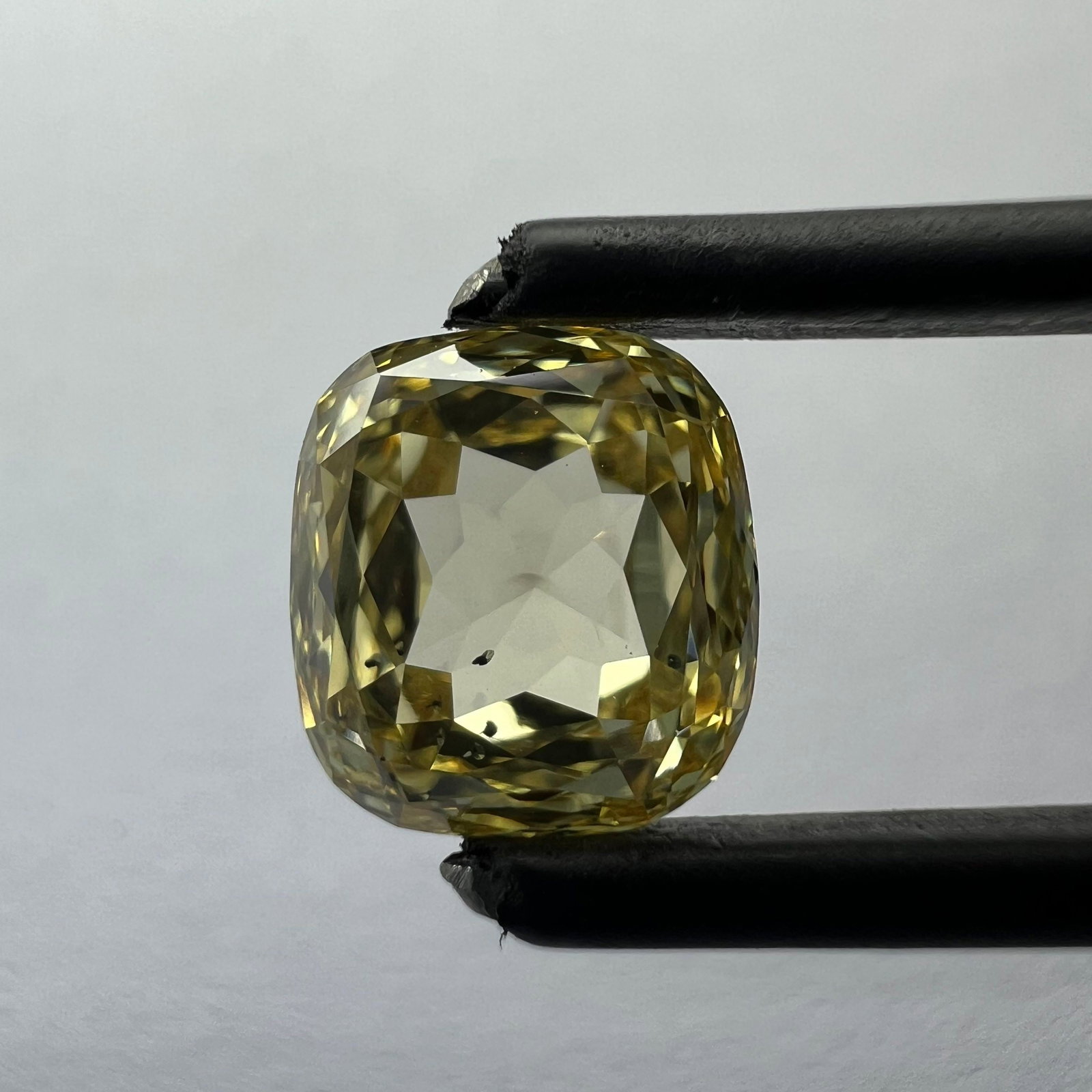 Loose Diamond - CUSHION BRILLIANT 1.79ct Yellow VS2: Loose Diamond - CUSHION BRILLIANT 1.79ct Yellow VS2 Source: This is a real non-mined Diamond that has been grown in a lab Shape: CUSHION BRILLIANT Carats: 1.79 Color: Yellow Certification: NONE The Di