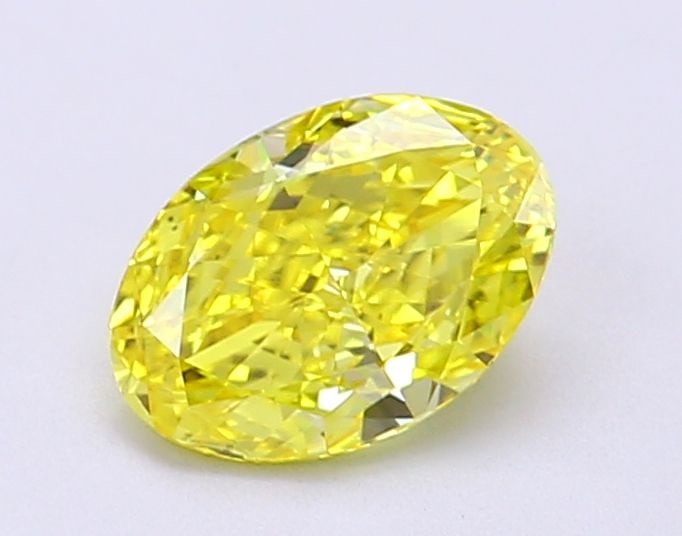 Loose Diamond - OVAL 1.02ct Fancy Vivid Yellow VVS2: Loose Diamond - OVAL 1.02ct Fancy Vivid Yellow VVS2 Source: This is a real non-mined Diamond that has been grown in a lab Shape: OVAL Carats: 1.02 Color: Fancy Vivid Yellow Certification: IGI Video: