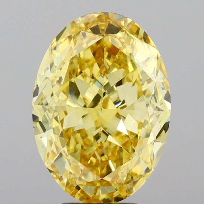 Loose Diamond - OVAL 9.54ct Fancy Vivid Yellow VS1: Loose Diamond - OVAL 9.54ct Fancy Vivid Yellow VS1 Source: This is a real non-mined Diamond that has been grown in a lab Shape: OVAL Carats: 9.54 Color: Fancy Vivid Yellow Certification: IGI Video: