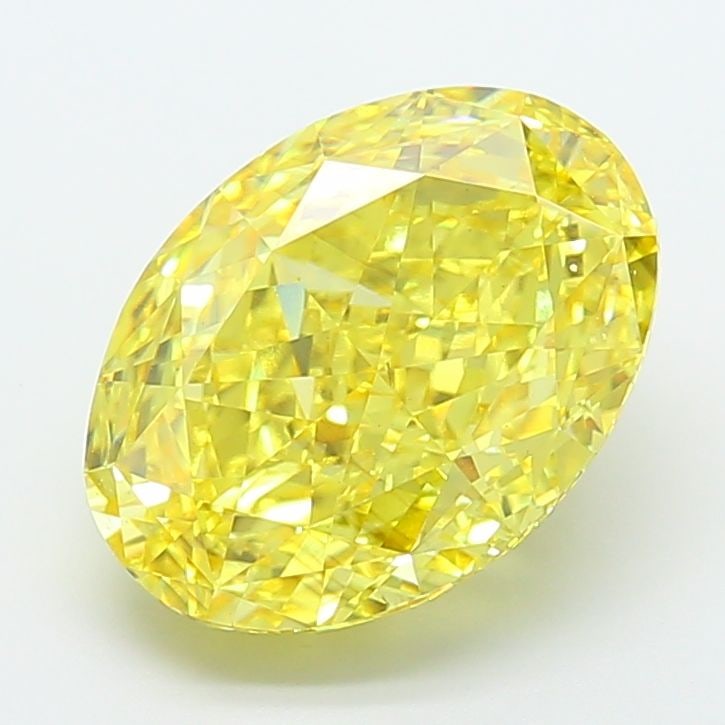 Loose Diamond - OVAL 7.04ct Fancy Vivid Yellow VS2: Loose Diamond - OVAL 7.04ct Fancy Vivid Yellow VS2 Source: This is a real non-mined Diamond that has been grown in a lab Shape: OVAL Carats: 7.04 Color: Fancy Vivid Yellow Certification: IGI Video: