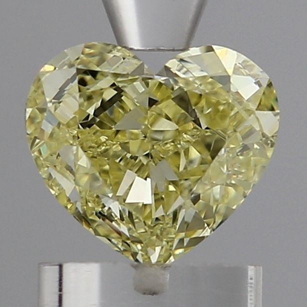 Loose Diamond - HEART 1.06ct Fancy Intense Yellow VS2: Loose Diamond - HEART 1.06ct Fancy Intense Yellow VS2 Source: This is a real non-mined Diamond that has been grown in a lab Shape: HEART Carats: 1.06 Color: Fancy Intense Yellow Certification: IGI Vid