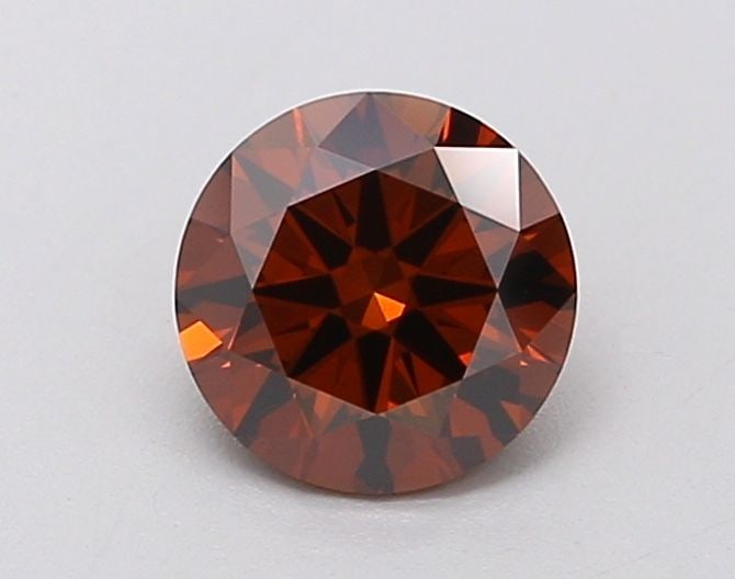Loose Diamond - ROUND 0.68ct Fancy Deep Orange VS1: Loose Diamond - ROUND 0.68ct Fancy Deep Orange VS1 Source: This is a real non-mined Diamond that has been grown in a lab Shape: ROUND Carats: 0.68 Color: Fancy Deep Orange Certification: IGI Video: