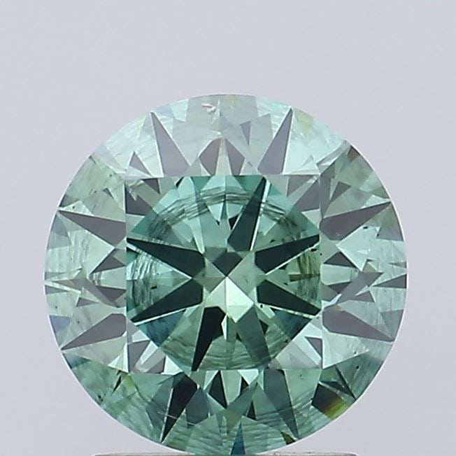 Ideal Loose Diamond - ROUND 1.52ct Fancy Vivid Green SI2: Ideal Loose Diamond - ROUND 1.52ct Fancy Vivid Green SI2 Source: This is a real non-mined Diamond that has been grown in a lab Shape: ROUND Carats: 1.52 Color: Fancy Vivid Green Certification: IGI Vid