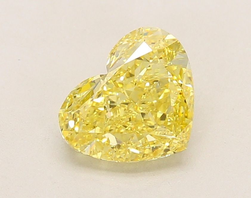 Loose Diamond - HEART 1.64ct Fancy Vivid Yellow VVS2: Loose Diamond - HEART 1.64ct Fancy Vivid Yellow VVS2 Source: This is a real non-mined Diamond that has been grown in a lab Shape: HEART Carats: 1.64 Color: Fancy Vivid Yellow Certification: IGI Video: