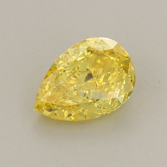 Loose Diamond - PEAR 0.58ct Fancy Vivid Yellow VS2: Loose Diamond - PEAR 0.58ct Fancy Vivid Yellow VS2 Source: This is a real non-mined Diamond that has been grown in a lab Shape: PEAR Carats: 0.58 Color: Fancy Vivid Yellow Certification: IGI Video: