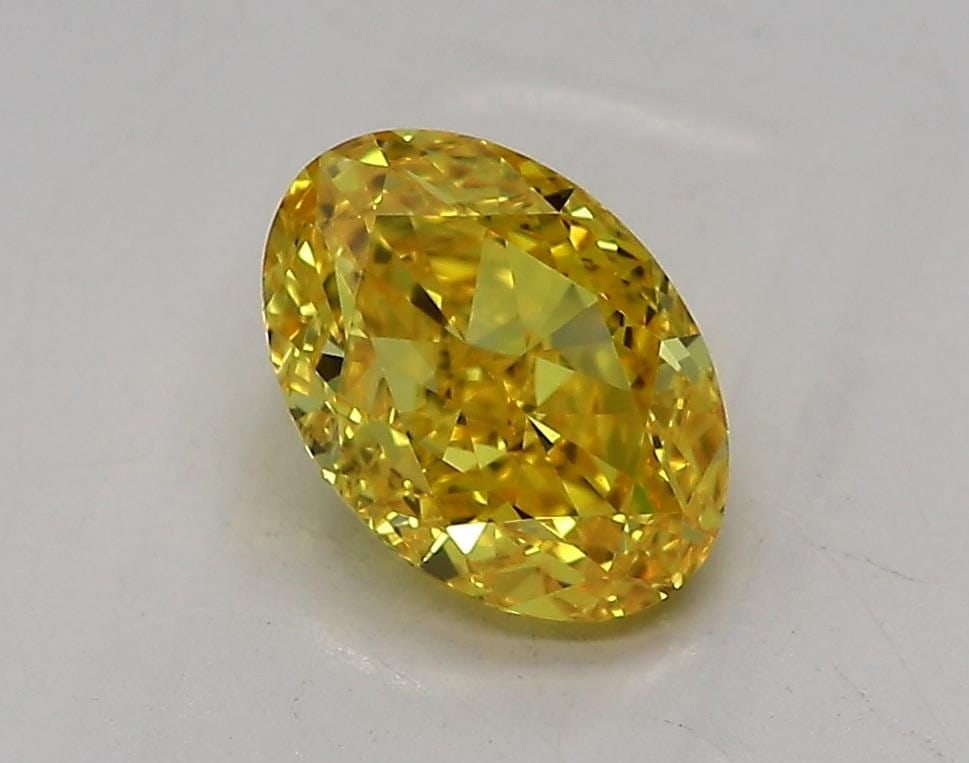 Loose Diamond - OVAL 1.1ct Fancy Vivid Yellow VVS2: Loose Diamond - OVAL 1.1ct Fancy Vivid Yellow VVS2 Source: This is a real non-mined Diamond that has been grown in a lab Shape: OVAL Carats: 1.1 Color: Fancy Vivid Yellow Certification: IGI Video: