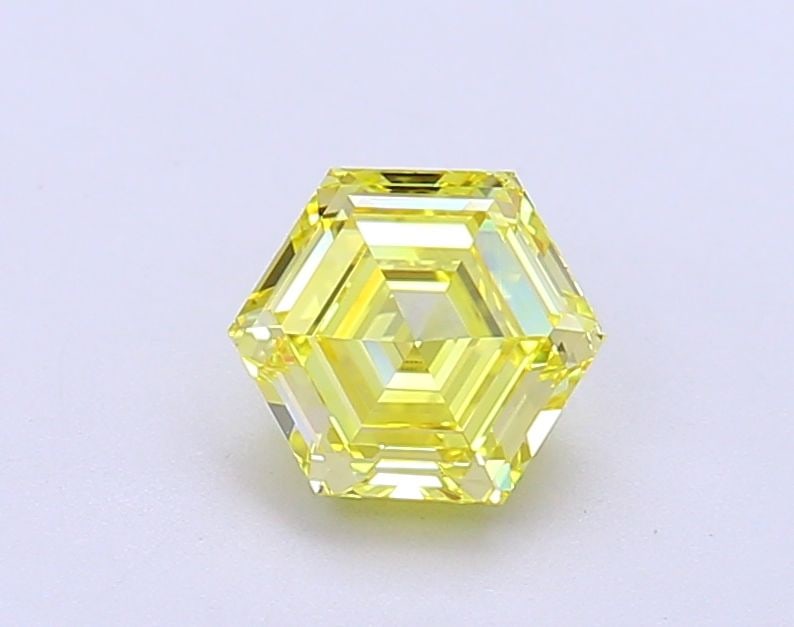 Loose Diamond - HEXAGONAL 1.0ct Fancy Vivid Yellow VVS2: Loose Diamond - HEXAGONAL 1.0ct Fancy Vivid Yellow VVS2 Source: This is a real non-mined Diamond that has been grown in a lab Shape: HEXAGONAL Carats: 1.0 Color: Fancy Vivid Yellow Certification: IGI 