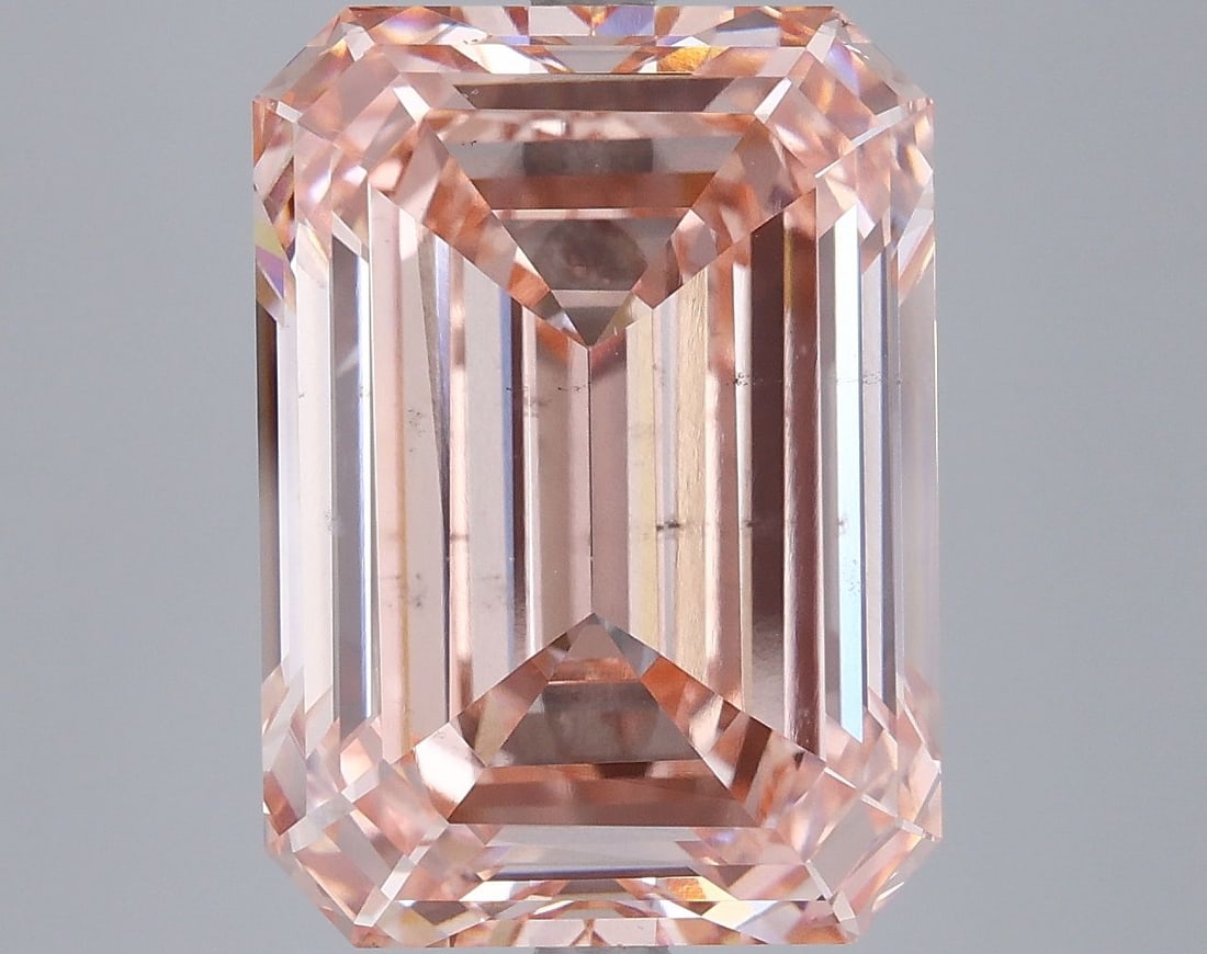 Loose Diamond - EMERALD 9.99ct Fancy Vivid Pink VS2: Loose Diamond - EMERALD 9.99ct Fancy Vivid Pink VS2 Source: This is a real non-mined Diamond that has been grown in a lab Shape: EMERALD Carats: 9.99 Color: Fancy Vivid Pink Certification: IGI The Dia