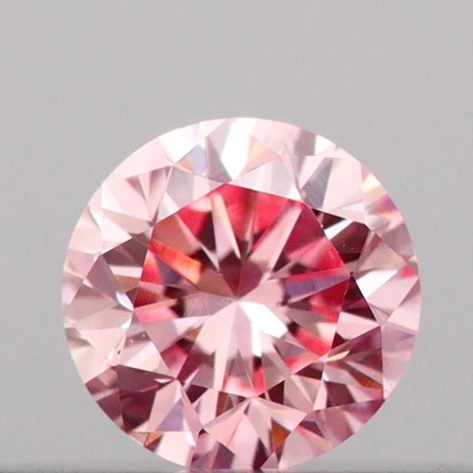 Loose Diamond - ROUND 0.14ct Fancy Intense Pink VS1: Loose Diamond - ROUND 0.14ct Fancy Intense Pink VS1 Source: This is a real non-mined Diamond that has been grown in a lab Shape: ROUND Carats: 0.14 Color: Fancy Intense Pink Certification: IGI Video: