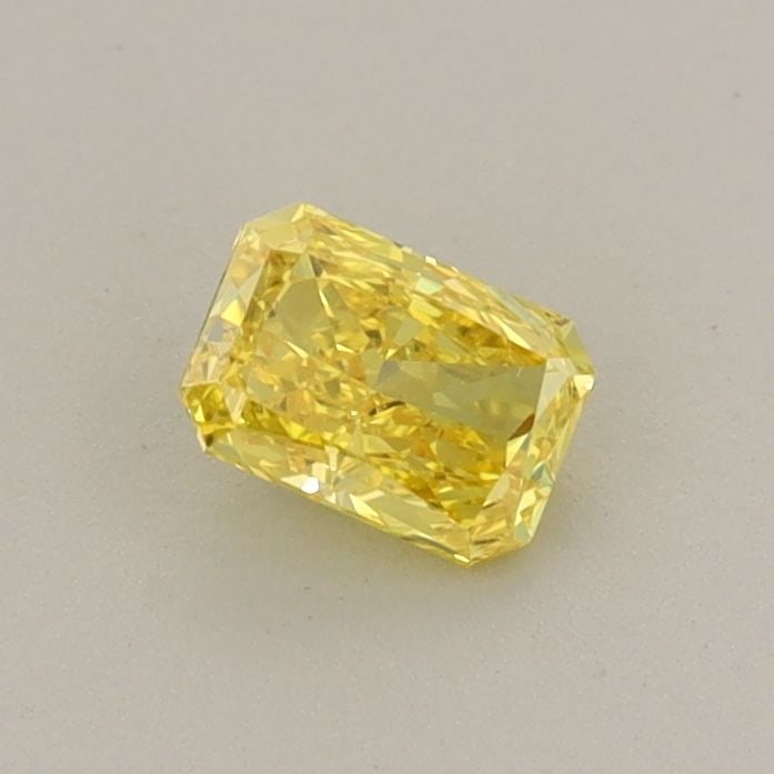 Loose Diamond - RADIANT 0.34ct Fancy Vivid Yellow VVS2: Loose Diamond - RADIANT 0.34ct Fancy Vivid Yellow VVS2 Source: This is a real non-mined Diamond that has been grown in a lab Shape: RADIANT Carats: 0.34 Color: Fancy Vivid Yellow Certification: IGI Vi