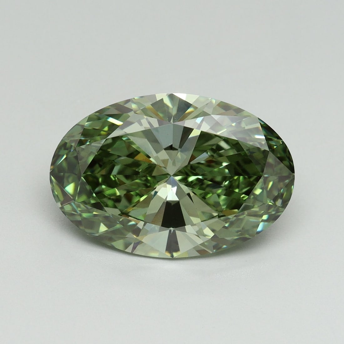 Loose Diamond - OVAL 5.2ct Fancy Vivid Green VS1: Loose Diamond - OVAL 5.2ct Fancy Vivid Green VS1 Source: This is a real non-mined Diamond that has been grown in a lab Shape: OVAL Carats: 5.2 Color: Fancy Vivid Green Certification: IGI Video: