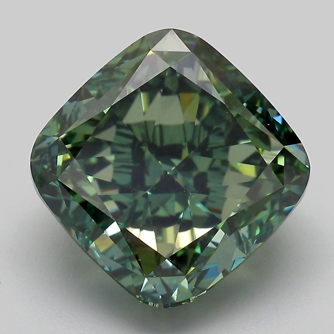 Loose Diamond - CUSHION MODIFIED 9.2ct Fancy Vivid Green VS1: Loose Diamond - CUSHION MODIFIED 9.2ct Fancy Vivid Green VS1 Source: This is a real non-mined Diamond that has been grown in a lab Shape: CUSHION MODIFIED Carats: 9.2 Color: Fancy Vivid Green Certific