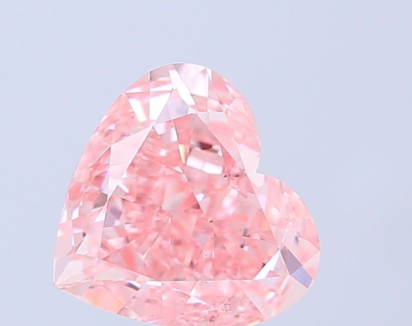 Loose Diamond - HEART 4.06ct Fancy Vivid Pink VS2: Loose Diamond - HEART 4.06ct Fancy Vivid Pink VS2 Source: This is a real non-mined Diamond that has been grown in a lab Shape: HEART Carats: 4.06 Color: Fancy Vivid Pink Certification: IGI Video: