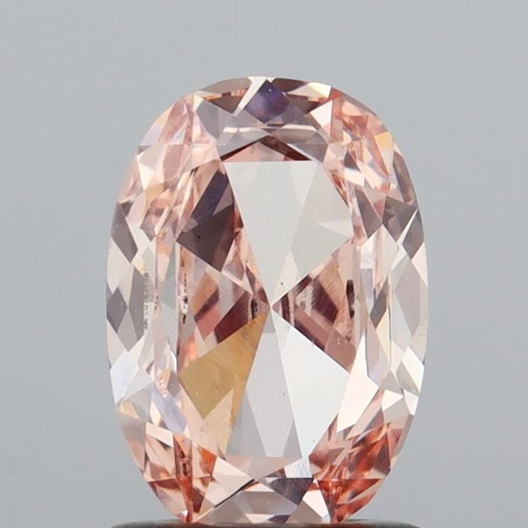 Loose Diamond - OVAL 1.0ct Fancy Pink VS1: Loose Diamond - OVAL 1.0ct Fancy Pink VS1 Source: This is a real non-mined Diamond that has been grown in a lab Shape: OVAL Carats: 1.0 Color: Fancy Pink Certification: IGI Video: