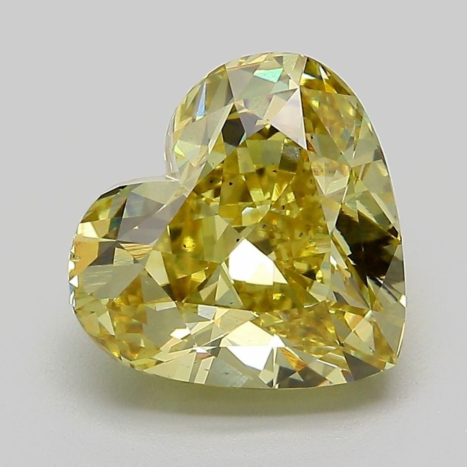 Loose Diamond - HEART 4.06ct Fancy Yellow VS2: Loose Diamond - HEART 4.06ct Fancy Yellow VS2 Source: This is a real non-mined Diamond that has been grown in a lab Shape: HEART Carats: 4.06 Color: Fancy Yellow Certification: IGI Video: