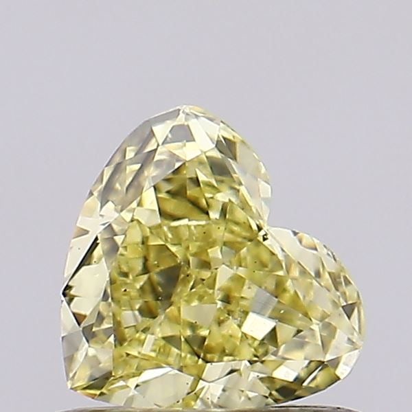 Loose Diamond - HEART 0.52ct Fancy Yellow VS2: Loose Diamond - HEART 0.52ct Fancy Yellow VS2 Source: This is a real non-mined Diamond that has been grown in a lab Shape: HEART Carats: 0.52 Color: Fancy Yellow Certification: IGI Video: