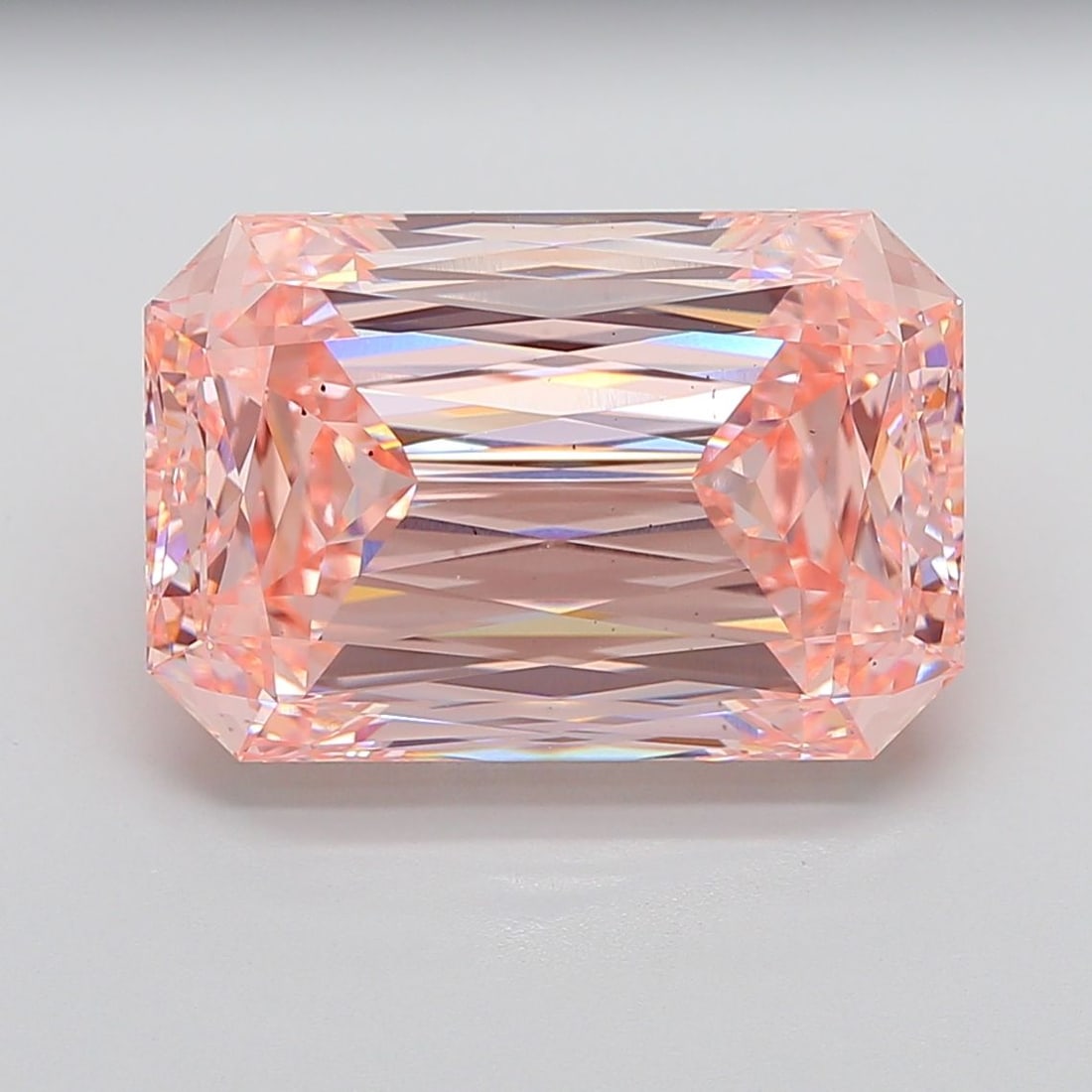 Loose Diamond - RADIANT 21.33ct Fancy Vivid Pink VS2: Loose Diamond - RADIANT 21.33ct Fancy Vivid Pink VS2 Source: This is a real non-mined Diamond that has been grown in a lab Shape: RADIANT Carats: 21.33 Color: Fancy Vivid Pink Certification: IGI Video