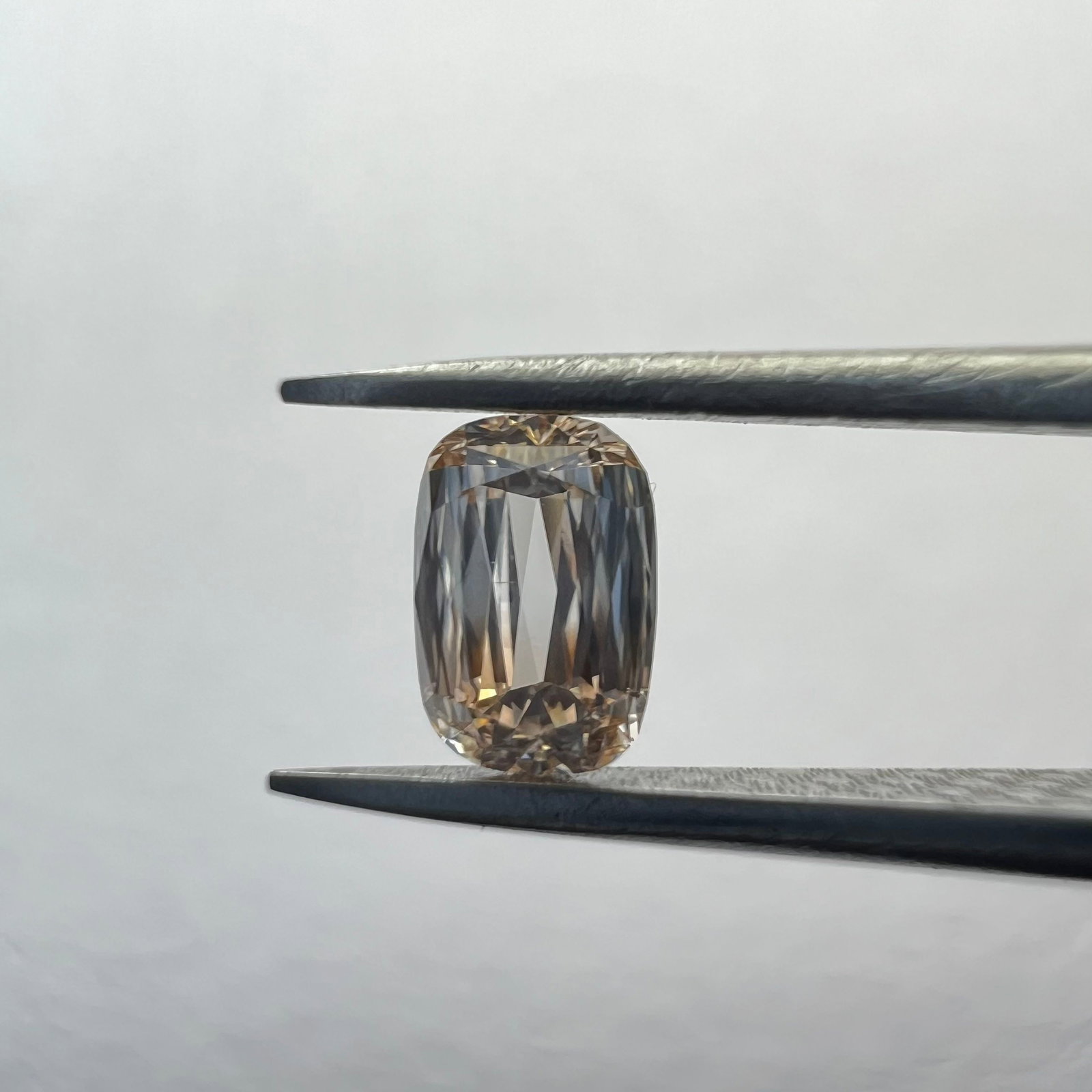 Loose Diamond - CUSHION BRILLIANT 0.16ct Brown VS2: Loose Diamond - CUSHION BRILLIANT 0.16ct Brown VS2 Source: This is a real non-mined Diamond that has been grown in a lab Shape: CUSHION BRILLIANT Carats: 0.16 Color: Brown Certification: NONE The Diam