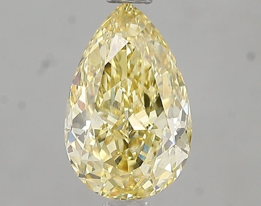 Loose Diamond - PEAR 1.55ct Fancy Intense Yellow VS2: Loose Diamond - PEAR 1.55ct Fancy Intense Yellow VS2 Source: This is a real non-mined Diamond that has been grown in a lab Shape: PEAR Carats: 1.55 Color: Fancy Intense Yellow Certification: IGI Video