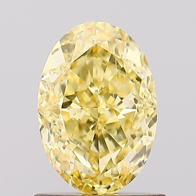 Loose Diamond - OVAL 1.12ct Fancy Vivid Yellow SI1: Loose Diamond - OVAL 1.12ct Fancy Vivid Yellow SI1 Source: This is a real non-mined Diamond that has been grown in a lab Shape: OVAL Carats: 1.12 Color: Fancy Vivid Yellow Certification: IGI Video: