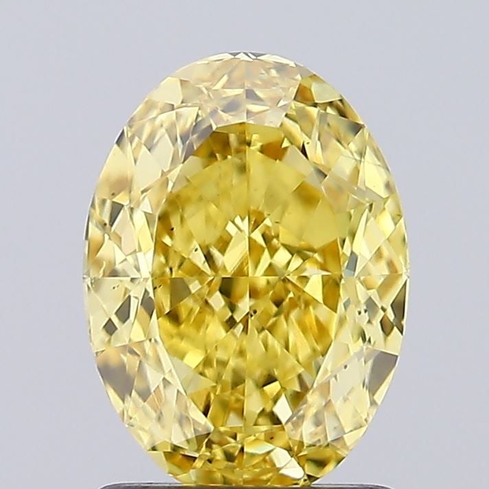 Loose Diamond - OVAL 1.54ct Fancy Vivid Yellow VS2: Loose Diamond - OVAL 1.54ct Fancy Vivid Yellow VS2 Source: This is a real non-mined Diamond that has been grown in a lab Shape: OVAL Carats: 1.54 Color: Fancy Vivid Yellow Certification: IGI Video: