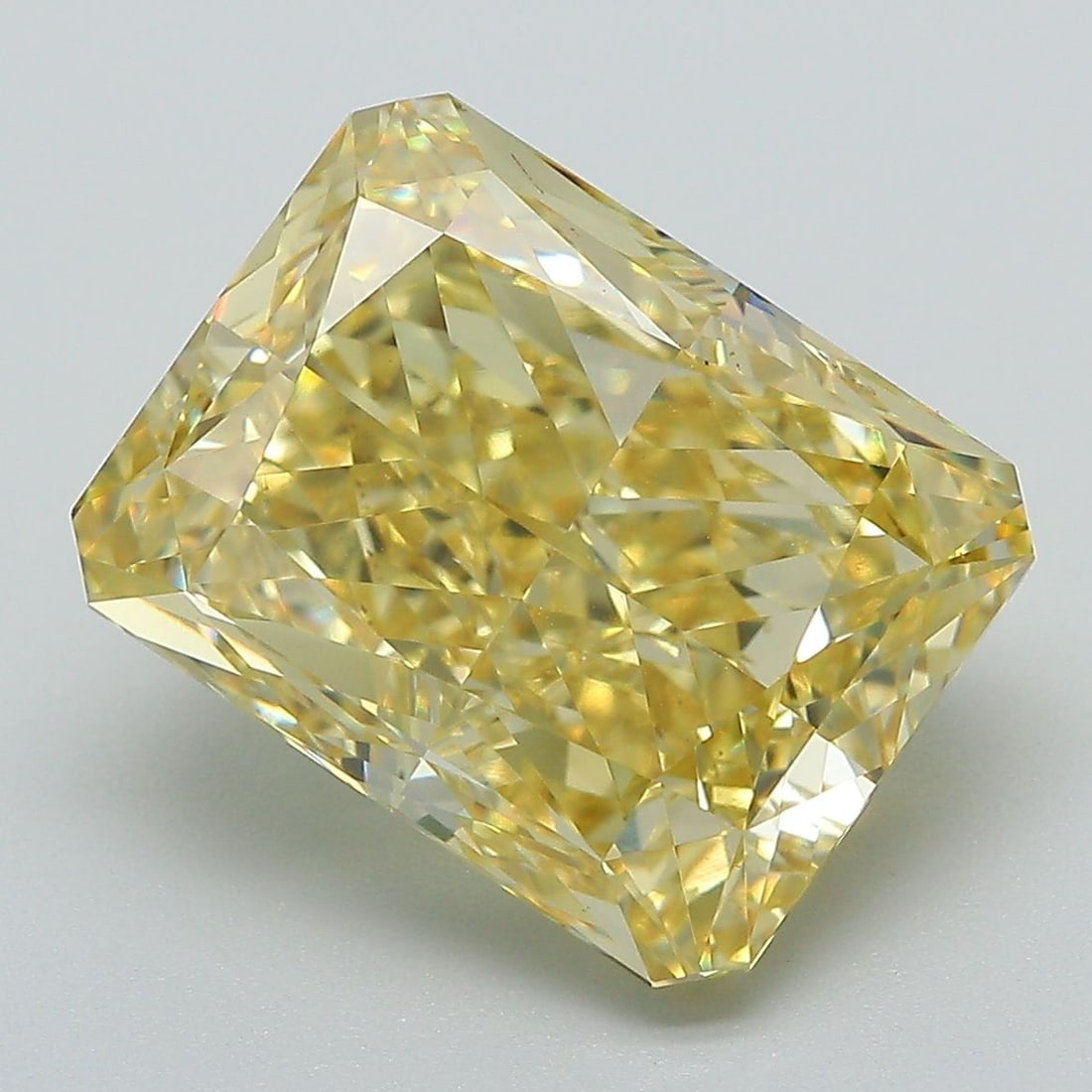 Loose Diamond - RADIANT 8.08ct Fancy Vivid Yellow VS1: Loose Diamond - RADIANT 8.08ct Fancy Vivid Yellow VS1 Source: This is a real non-mined Diamond that has been grown in a lab Shape: RADIANT Carats: 8.08 Color: Fancy Vivid Yellow Certification: IGI The