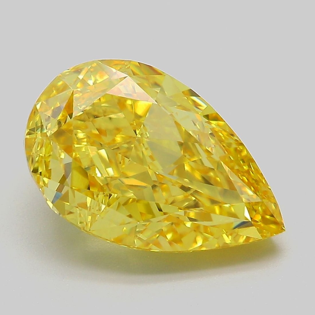Loose Diamond - PEAR 6.71ct Fancy Vivid Yellow VS1: Loose Diamond - PEAR 6.71ct Fancy Vivid Yellow VS1 Source: This is a real non-mined Diamond that has been grown in a lab Shape: PEAR Carats: 6.71 Color: Fancy Vivid Yellow Certification: IGI Video: