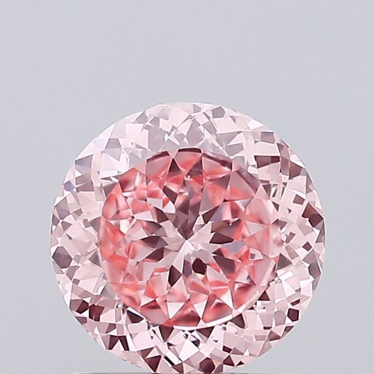 Loose Diamond - ROUND 1.02ct Fancy Vivid Pink VVS2: Loose Diamond - ROUND 1.02ct Fancy Vivid Pink VVS2 Source: This is a real non-mined Diamond that has been grown in a lab Shape: ROUND Carats: 1.02 Color: Fancy Vivid Pink Certification: IGI Video: