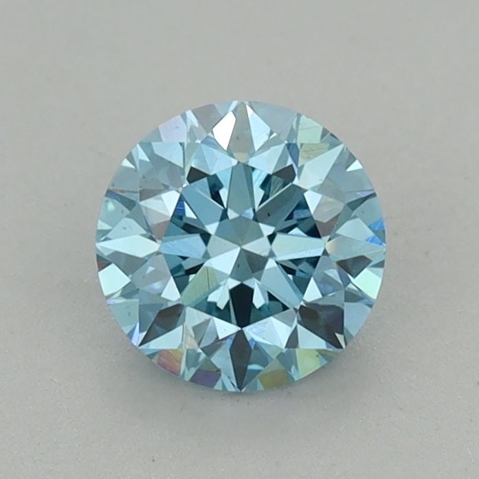 Loose Diamond - ROUND 0.77ct Fancy Vivid Blue VS1: Loose Diamond - ROUND 0.77ct Fancy Vivid Blue VS1 Source: This is a real non-mined Diamond that has been grown in a lab Shape: ROUND Carats: 0.77 Color: Fancy Vivid Blue Certification: IGI Video: