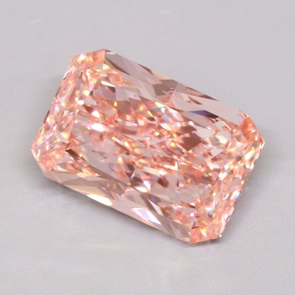 Loose Diamond - RADIANT 5.04ct Fancy Vivid Pink VS1: Loose Diamond - RADIANT 5.04ct Fancy Vivid Pink VS1 Source: This is a real non-mined Diamond that has been grown in a lab Shape: RADIANT Carats: 5.04 Color: Fancy Vivid Pink Certification: IGI Video: