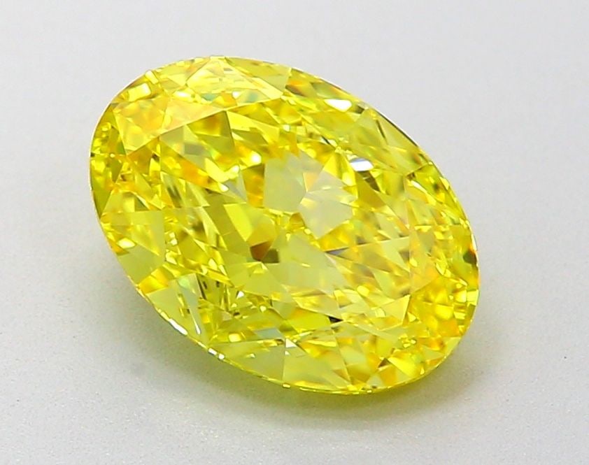 Loose Diamond - OVAL 2.08ct Fancy Vivid Yellow VVS2: Loose Diamond - OVAL 2.08ct Fancy Vivid Yellow VVS2 Source: This is a real non-mined Diamond that has been grown in a lab Shape: OVAL Carats: 2.08 Color: Fancy Vivid Yellow Certification: IGI Video: