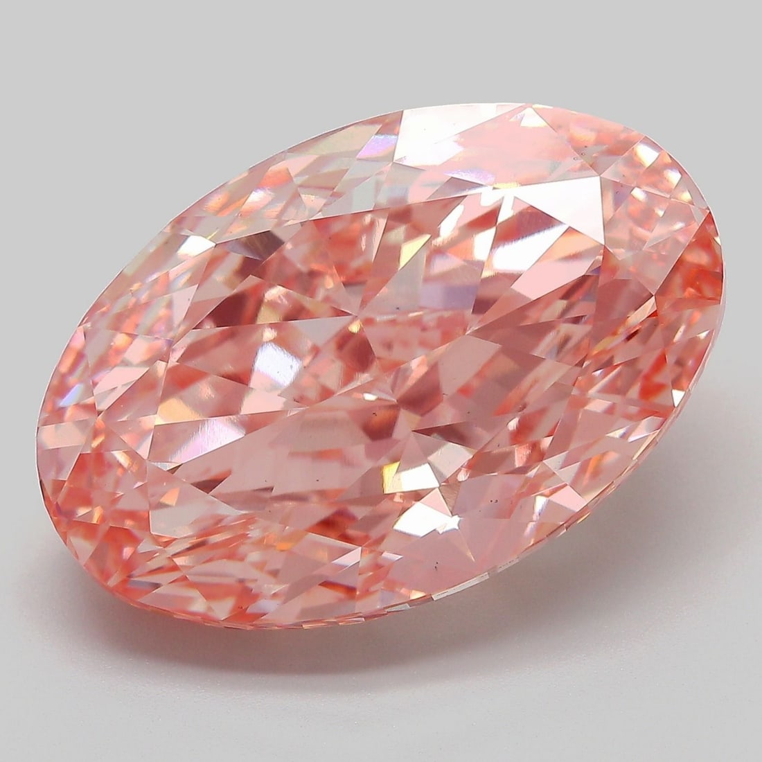 Loose Diamond - OVAL 20.08ct Fancy Vivid Pink VS1: Loose Diamond - OVAL 20.08ct Fancy Vivid Pink VS1 Source: This is a real non-mined Diamond that has been grown in a lab Shape: OVAL Carats: 20.08 Color: Fancy Vivid Pink Certification: IGI Video: