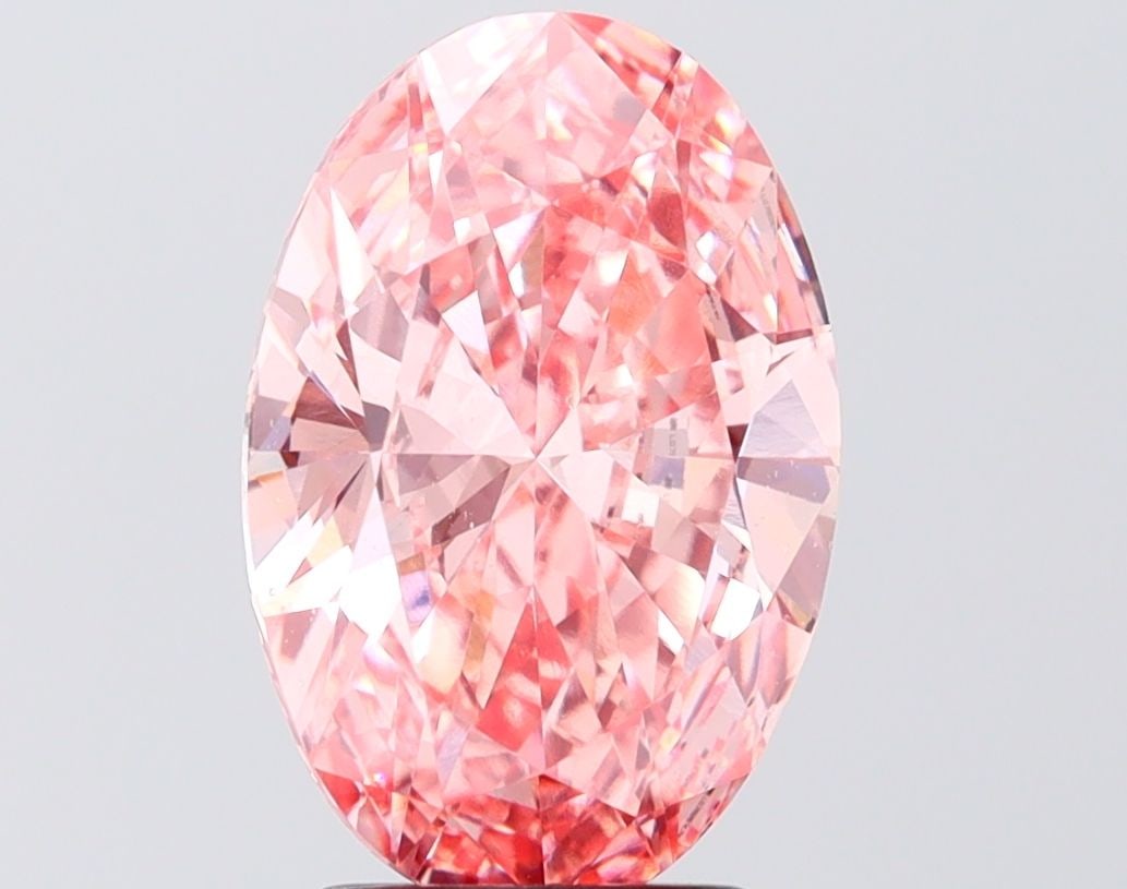 Loose Diamond - OVAL 3.0ct Fancy Vivid Pink VS2: Loose Diamond - OVAL 3.0ct Fancy Vivid Pink VS2 Source: This is a real non-mined Diamond that has been grown in a lab Shape: OVAL Carats: 3.0 Color: Fancy Vivid Pink Certification: IGI Video: