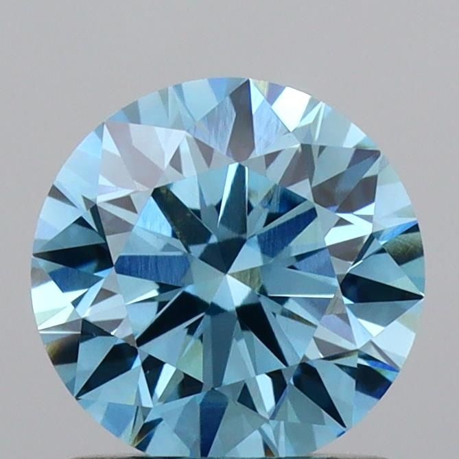 Ideal Loose Diamond - ROUND 1.03ct Fancy Vivid Blue VVS2: Ideal Loose Diamond - ROUND 1.03ct Fancy Vivid Blue VVS2 Source: This is a real non-mined Diamond that has been grown in a lab Shape: ROUND Carats: 1.03 Color: Fancy Vivid Blue Certification: IGI Vide