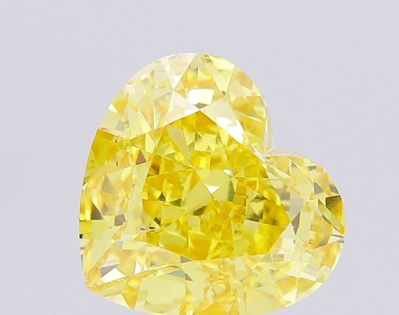 Loose Diamond - HEART 6.23ct Fancy Vivid Yellow VS2: Loose Diamond - HEART 6.23ct Fancy Vivid Yellow VS2 Source: This is a real non-mined Diamond that has been grown in a lab Shape: HEART Carats: 6.23 Color: Fancy Vivid Yellow Certification: IGI Video: