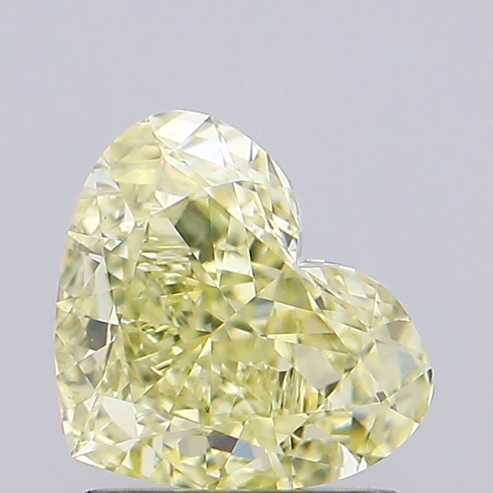 Loose Diamond - HEART 1.31ct Fancy Light Yellow VVS2: Loose Diamond - HEART 1.31ct Fancy Light Yellow VVS2 Source: This is a real non-mined Diamond that has been grown in a lab Shape: HEART Carats: 1.31 Color: Fancy Light Yellow Certification: IGI Video: