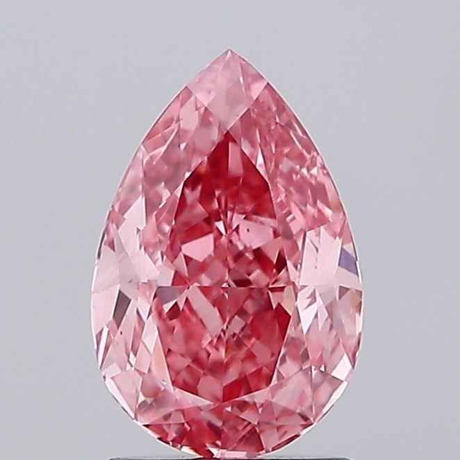 Loose Diamond - PEAR 1.44ct Fancy Vivid Pink VS1: Loose Diamond - PEAR 1.44ct Fancy Vivid Pink VS1 Source: This is a real non-mined Diamond that has been grown in a lab Shape: PEAR Carats: 1.44 Color: Fancy Vivid Pink Certification: IGI Video: