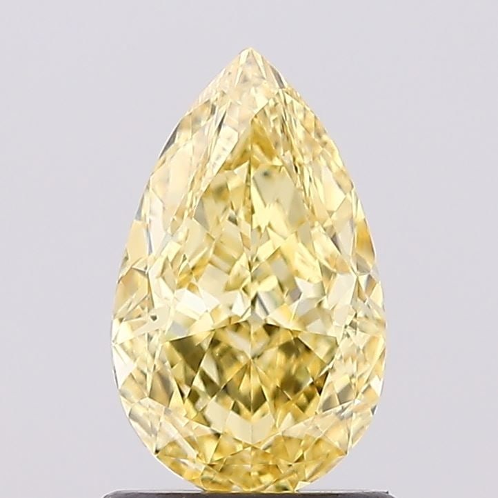 Loose Diamond - PEAR 1.12ct Fancy Vivid Yellow VS2: Loose Diamond - PEAR 1.12ct Fancy Vivid Yellow VS2 Source: This is a real non-mined Diamond that has been grown in a lab Shape: PEAR Carats: 1.12 Color: Fancy Vivid Yellow Certification: IGI Video: